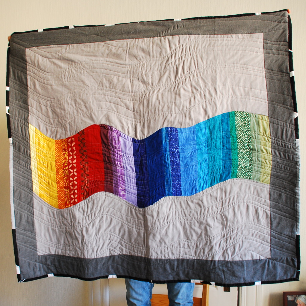 Rainbow Quilt by Pieced Together Quilts